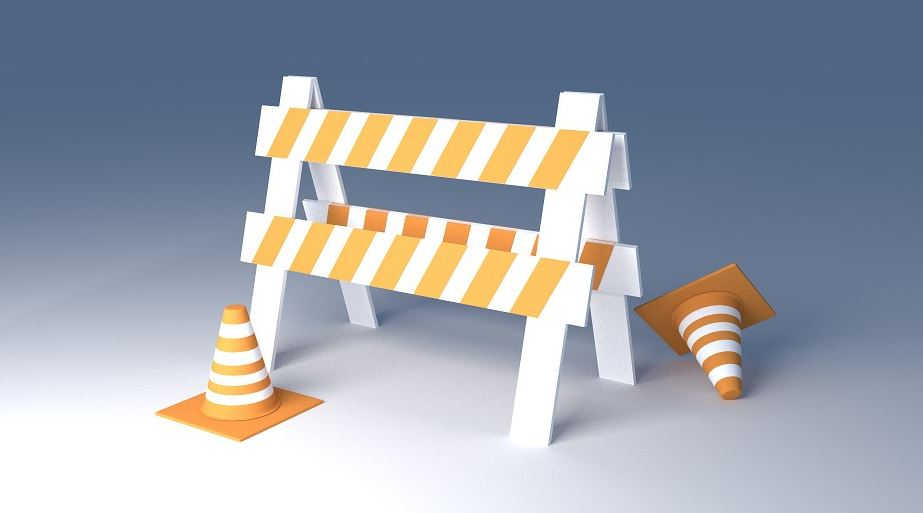 Barrera e conos de advertencia.