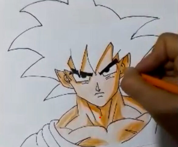 Fotografía de una mano dibujando un manga
